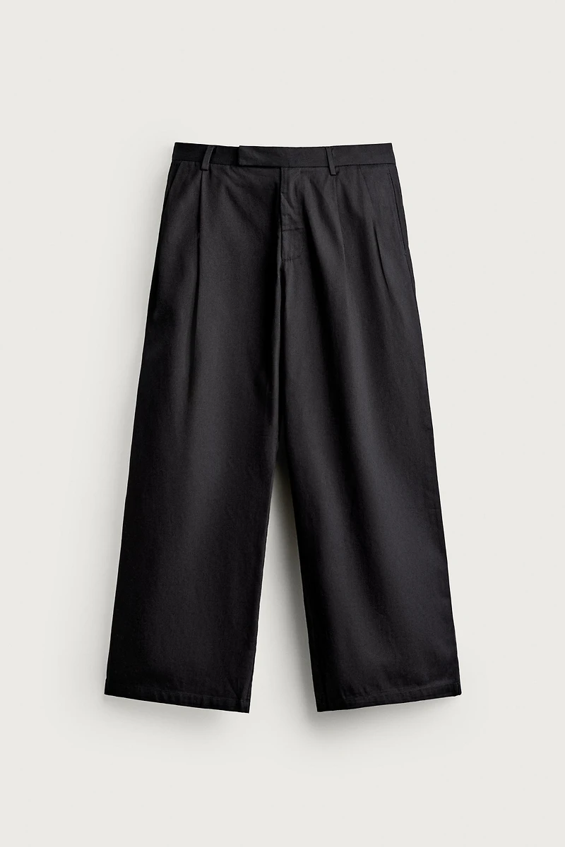 RELAXED FIT PLEATED PANTS