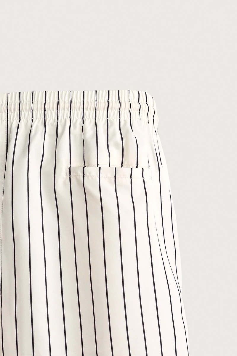 STRIPED MID-LENGTH SWIM TRUNKS
