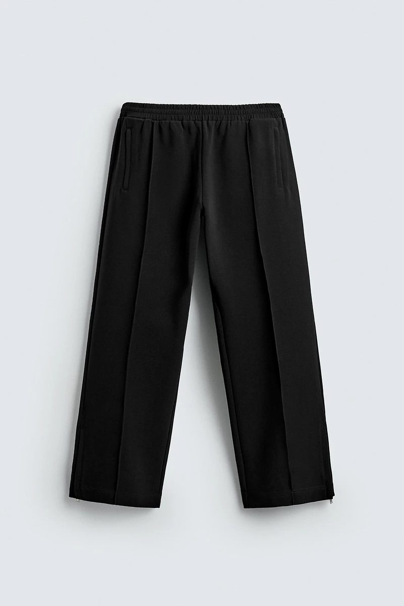 FLOWY ZIPPERED PANTS