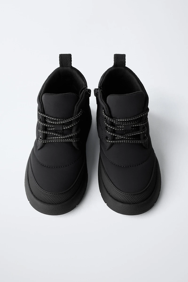 BOTTES EN NYLON DÉPERLANTES