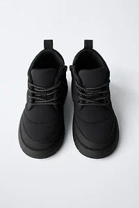 BOTTES EN NYLON DÉPERLANTES