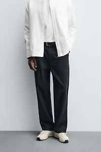 RELAXED FIT PLEATED PANTS