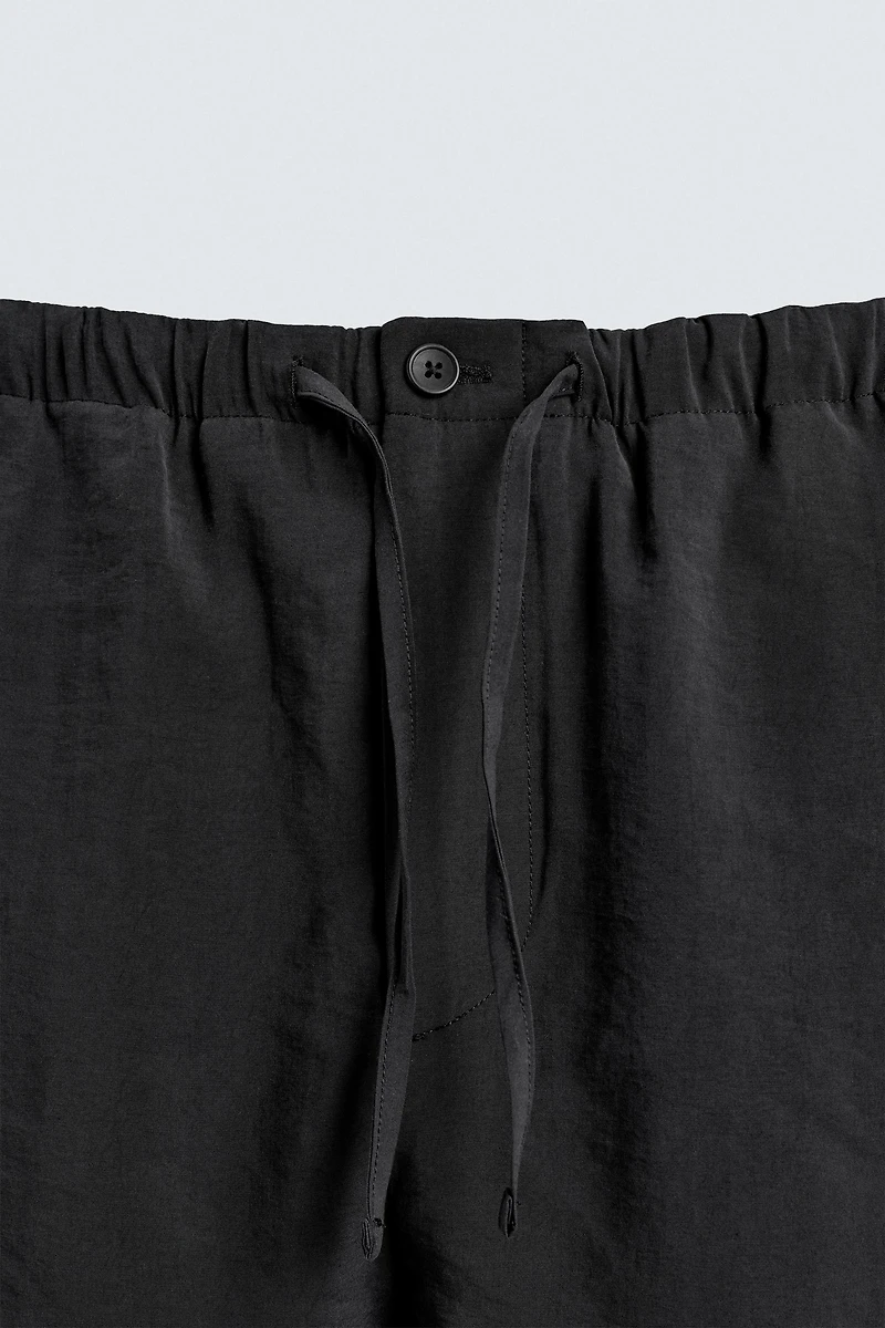 RELAXED FIT FLOWY PANTS