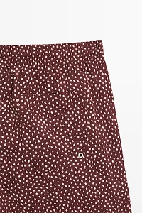 Polka dot print swimming trunks
