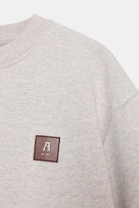 SWEAT ÉTIQUETTE AVANT