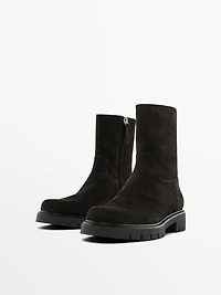 Split suede ankle boots with track sole