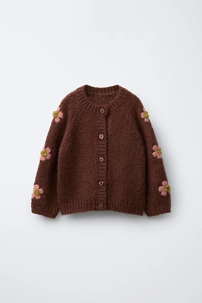 GILET EN MAILLE À FLEURS BRODÉES