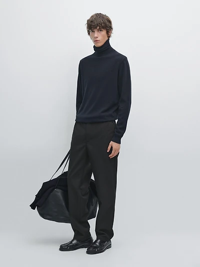 Pull à col montant en maille de laine mélangée