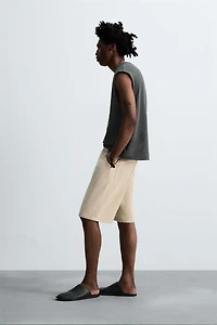 BAGGY FIT BERMUDA SHORTS © OTIS KWAME KYE QUAICOE