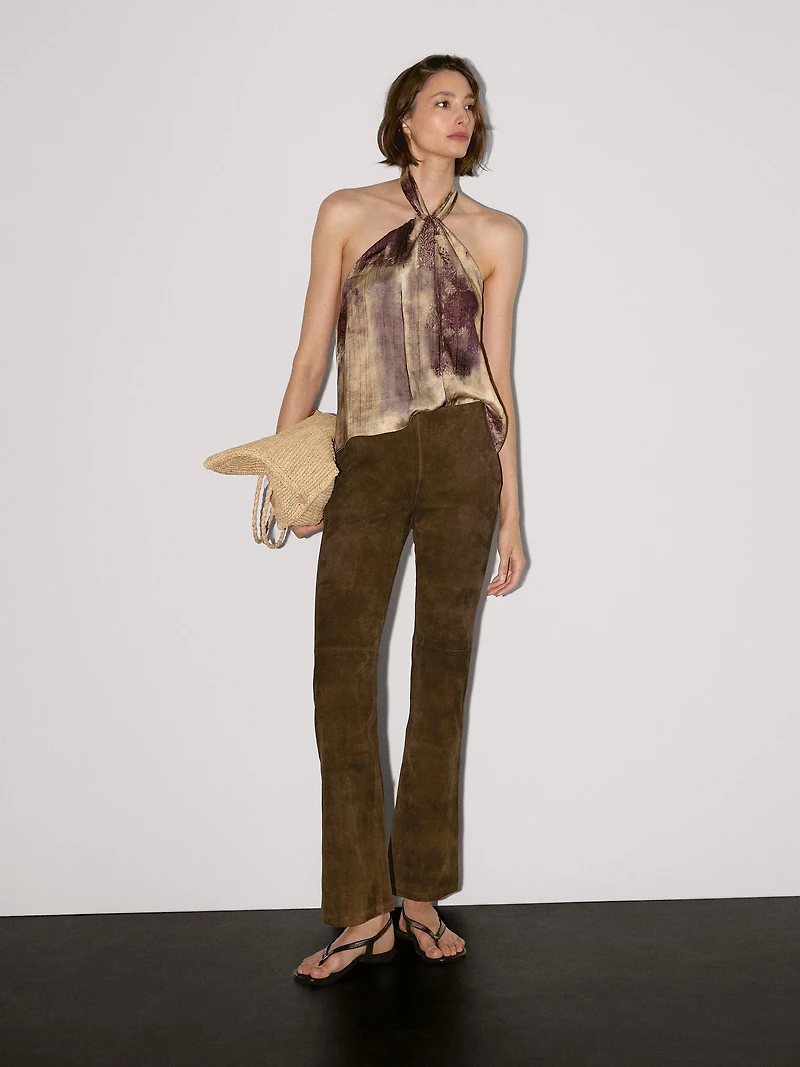 Pantalon flare en cuir finition daim