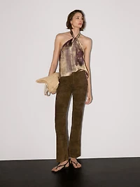 Pantalon flare en cuir finition daim