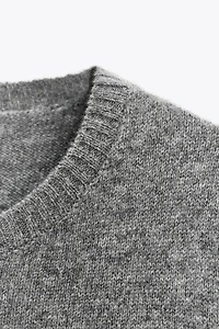 100% WOOL SHORT SLEEVE SWEATER