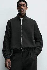 INTERLOCK ZIP SWEATSHIRT