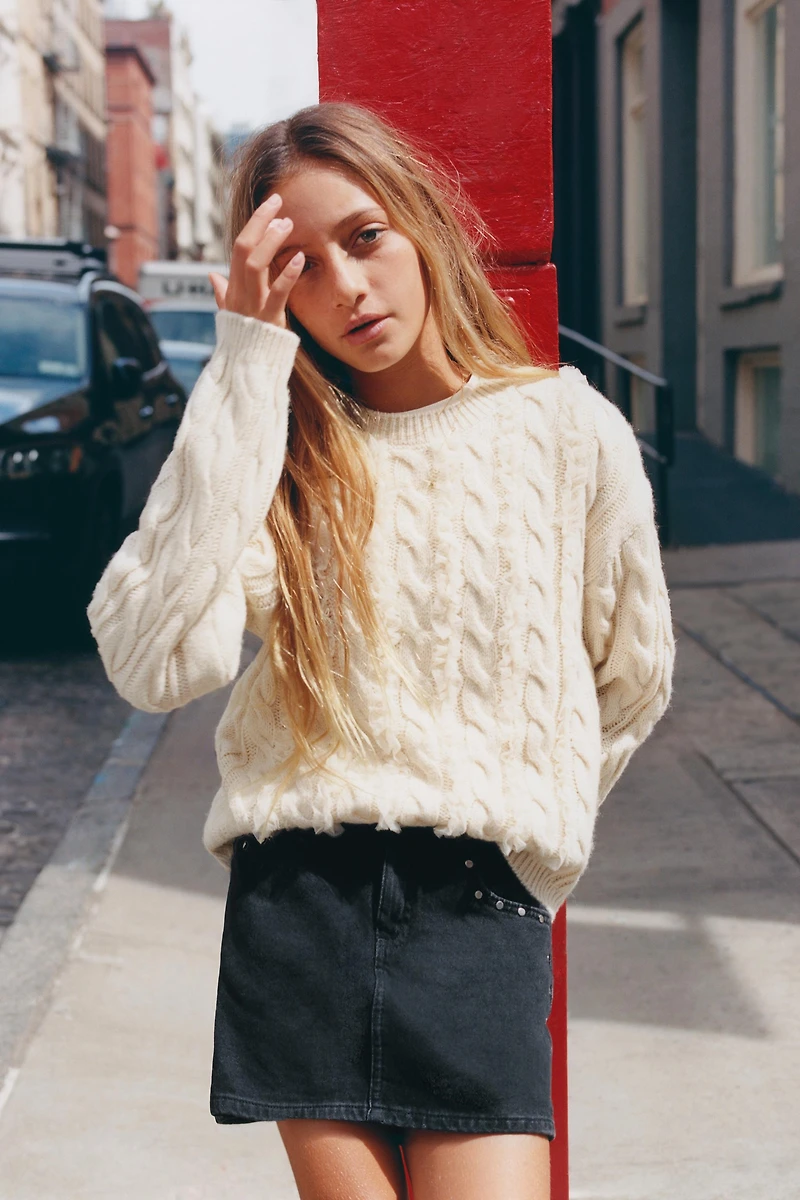 JUPE-SHORT EN JEAN À CLOUS