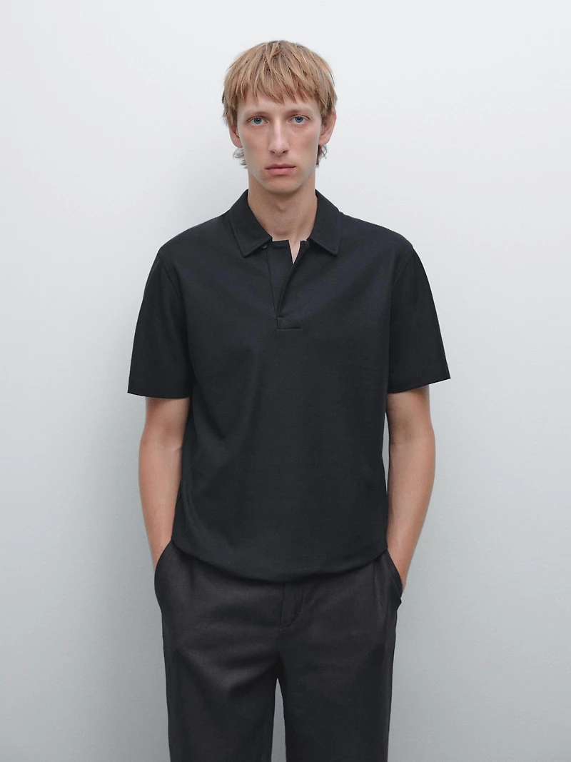 Polo texturé bouton dissimulé