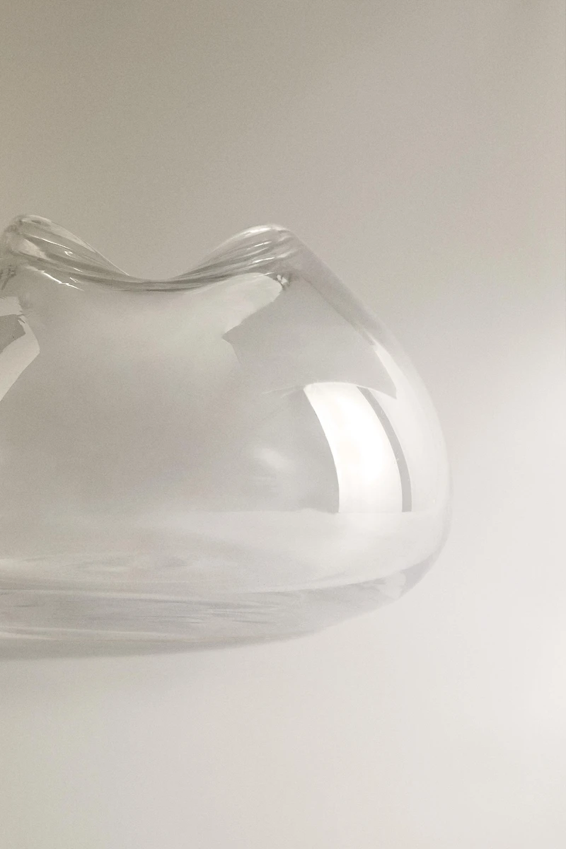 VASE WITH AN IRREGULAR LOW NECK