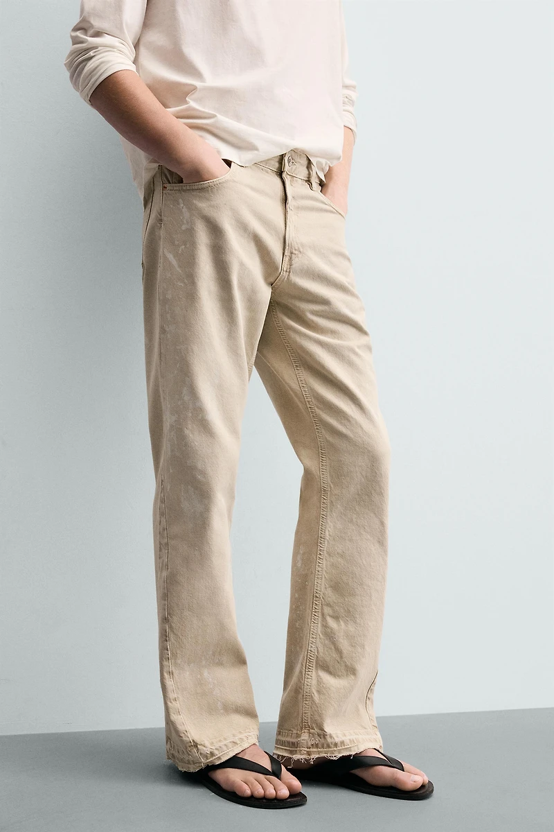 PAINT SPLATTER FLARE FIT JEANS