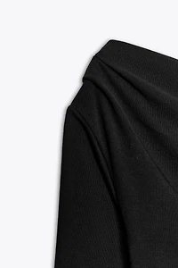 SOFT ASYMMETRIC TOP