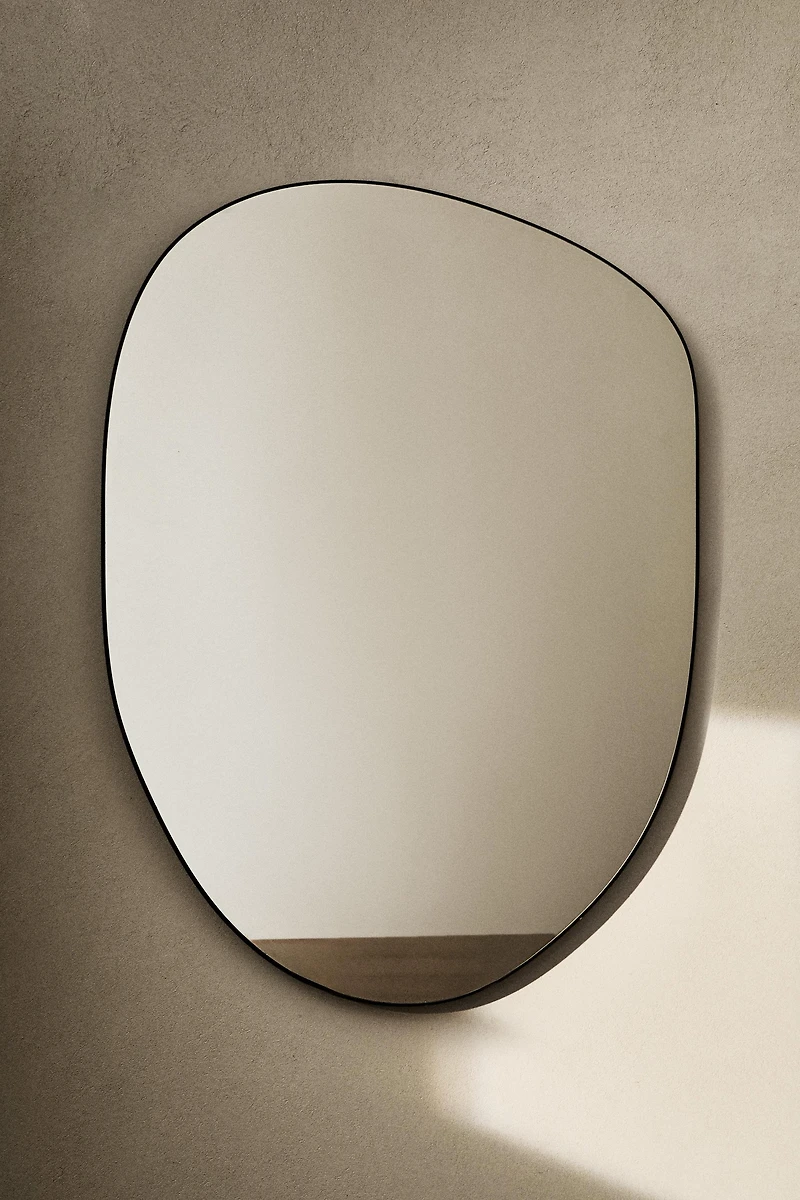 LARGE IRREGULAR WALL MIRROR