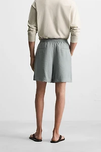 FLOWY RELAXED FIT BERMUDA SHORTS