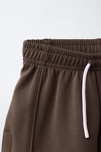 SHORT À INSCRIPTION EN MODAL