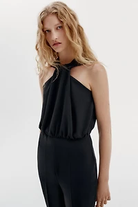 TWISTED NECK FLARE JUMPSUIT