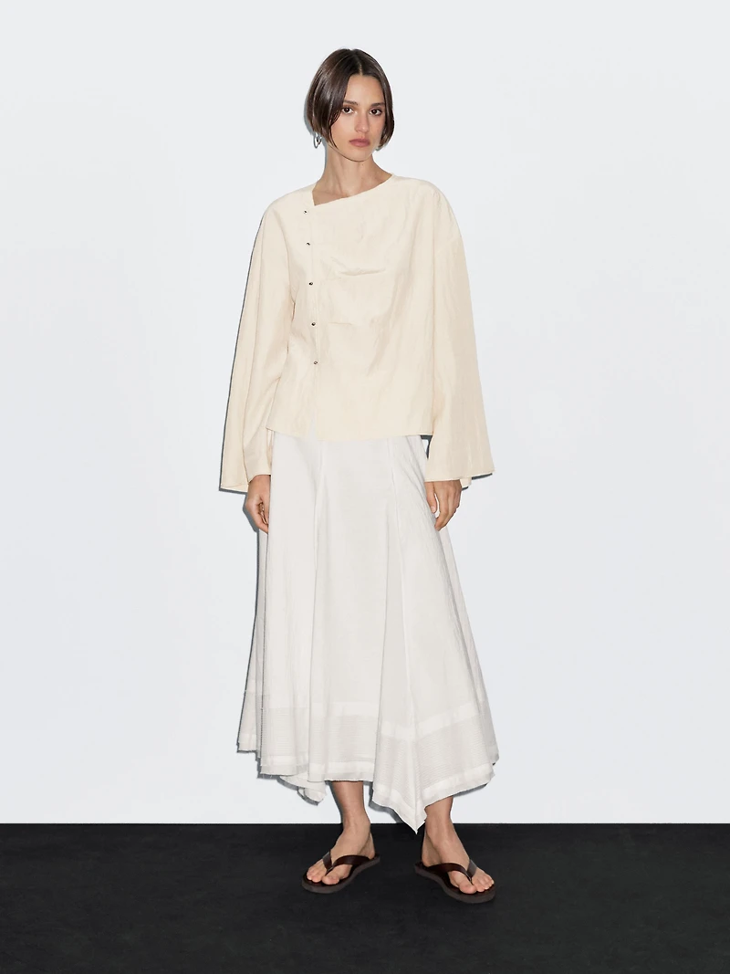 Long sleeve blouse with side button fastening