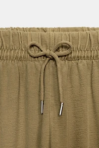 PANTALON EFFET DÉLAVÉ