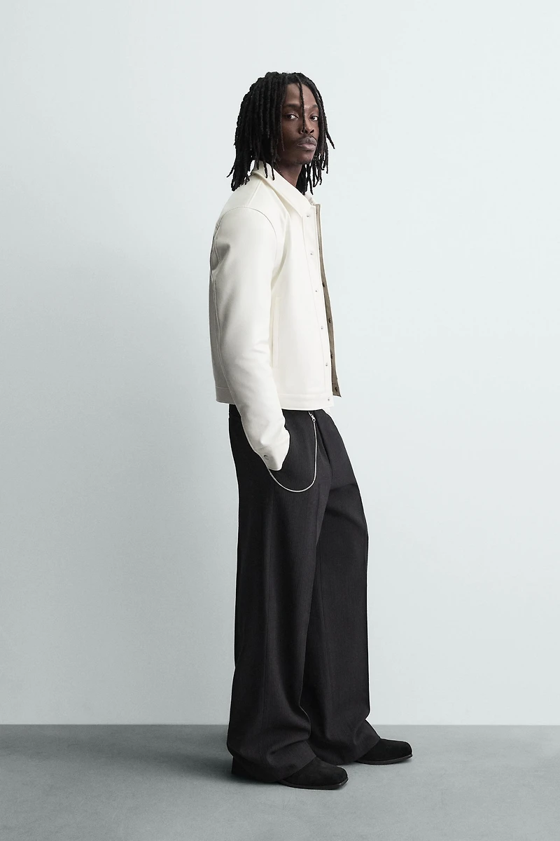 BLOUSON EN MATIÈRE SYNTHÉTIQUE BRILLANT