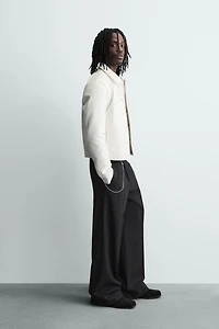 BLOUSON EN MATIÈRE SYNTHÉTIQUE BRILLANT