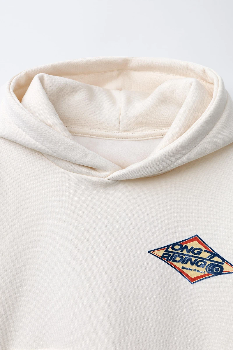 FLOCKED TEXT PRINTED HOODIE