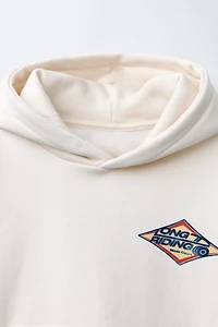 FLOCKED TEXT PRINTED HOODIE