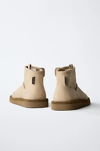 BOTTINES EFFET FOURRURE
