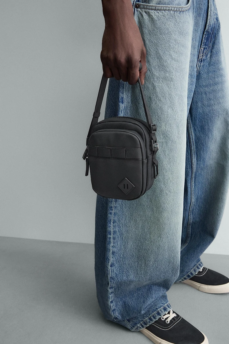 RUBBERIZED CROSSBODY BAG