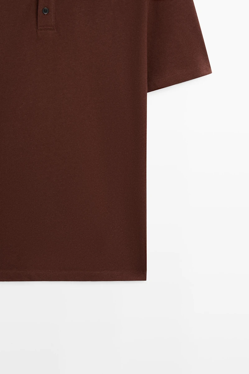 Polo micro-texturé en coton mélangé
