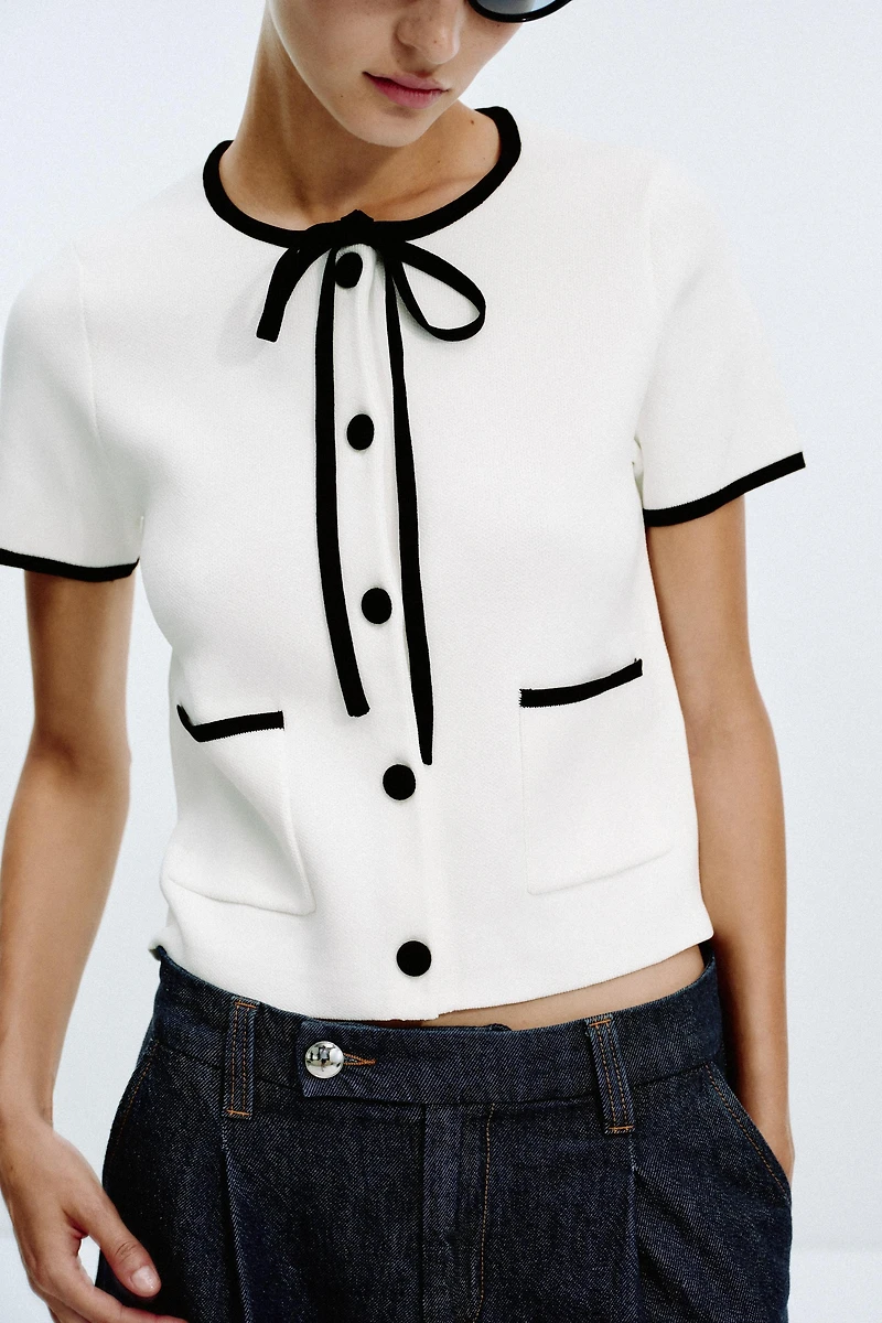VESTE EN MAILLE LISERÉS CONTRASTE