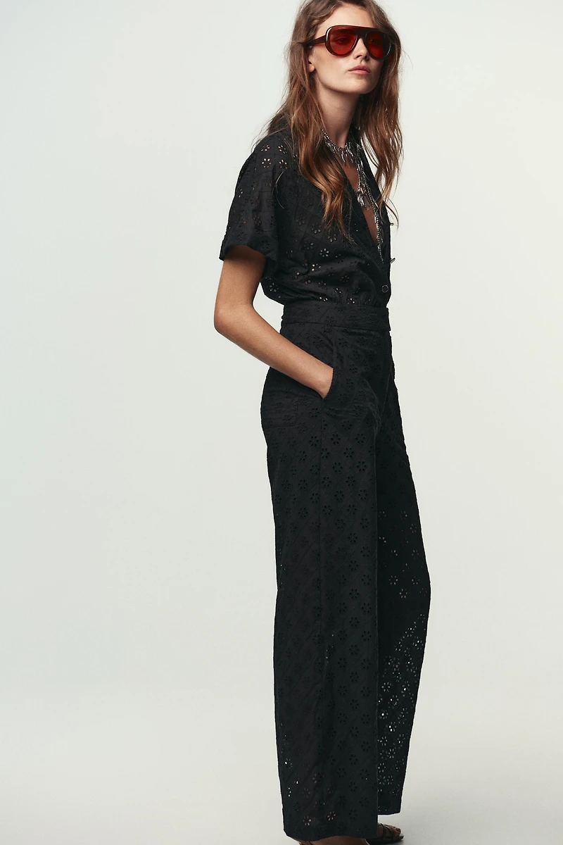 EMBROIDERED EYELET BUCKLE JUMPSUIT