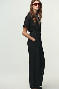 EMBROIDERED EYELET BUCKLE JUMPSUIT