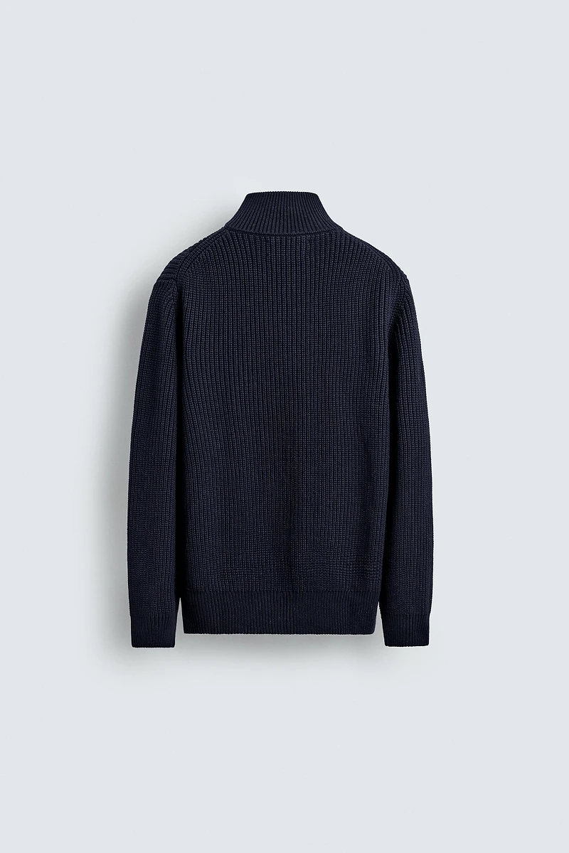 PULL EN MAILLE PERLÉE À COL ZIPPÉ
