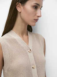 Knit vest with a high neck