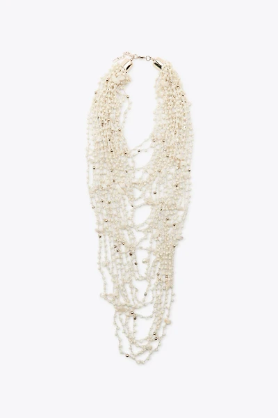COLLIER BAVOIR FANTAISIE COQUILLAGES