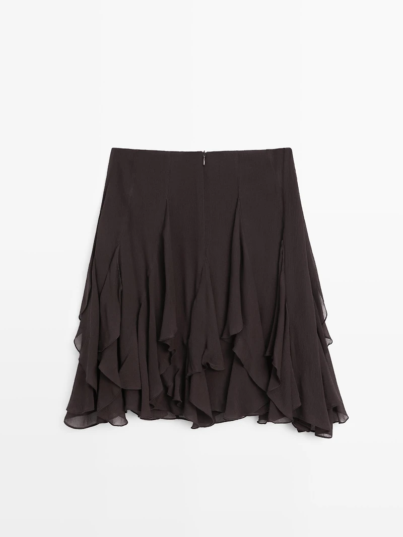 Asymmetric skirt with ruffles