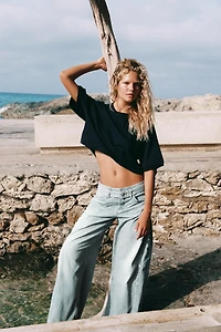 TRF MID-RISE PLEATED BELTED JEANS