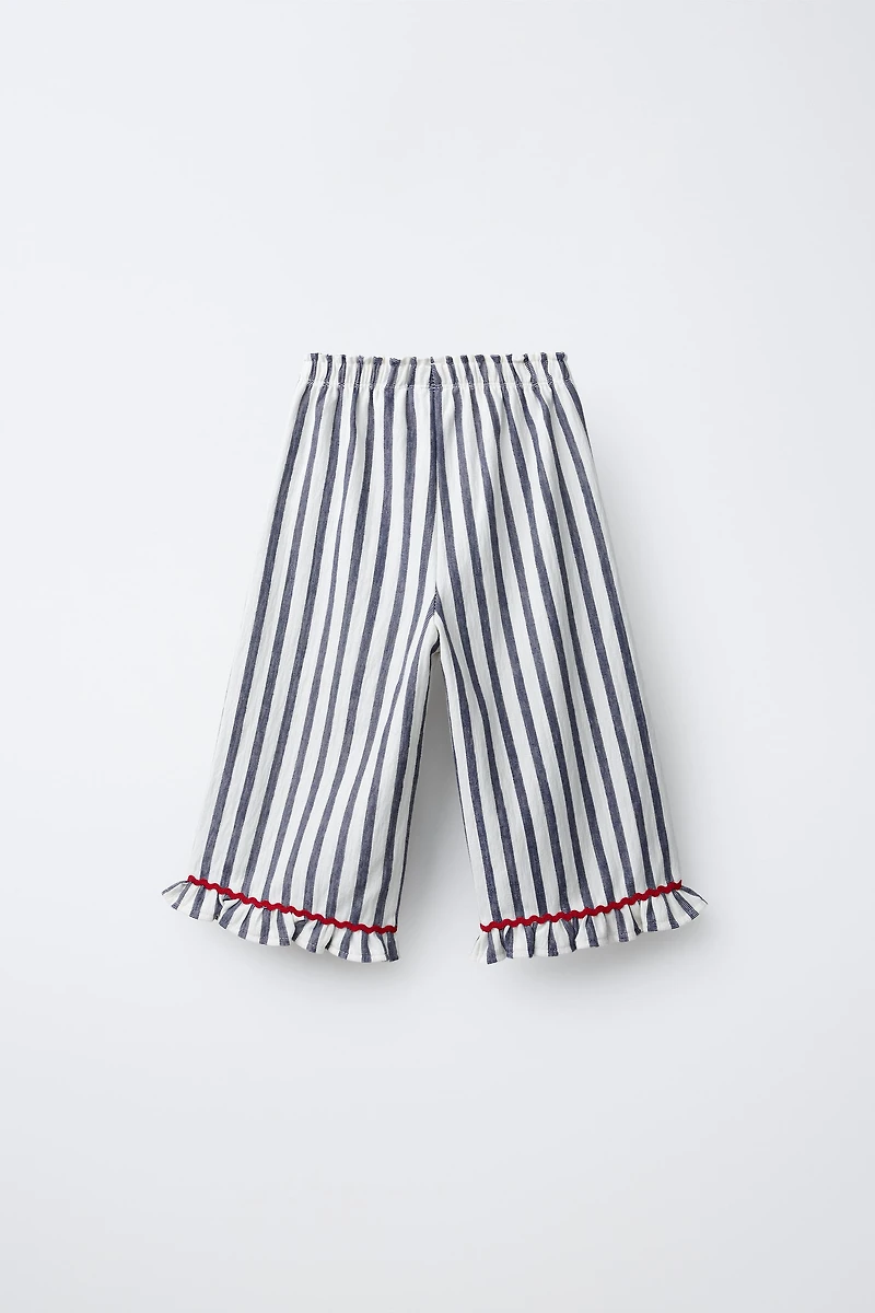 PANTALON À RAYURES TISSÉES ET VOLANTS