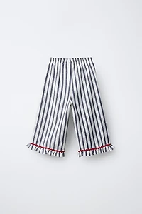 PANTALON À RAYURES TISSÉES ET VOLANTS