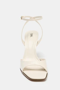 PATENT EFFECT HEELED SANDALS