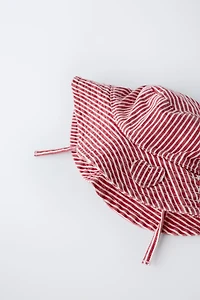 STRIPED BUCKET HAT WITH HEART PATCH