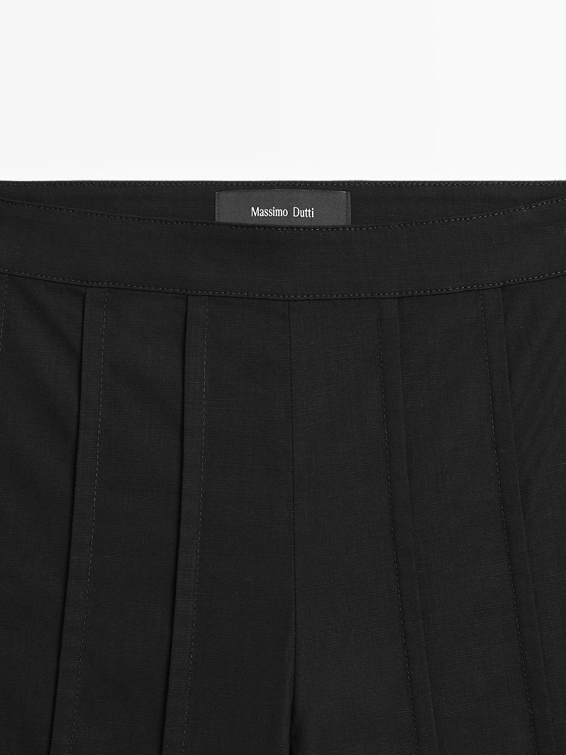 Wide-leg trousers with seam details