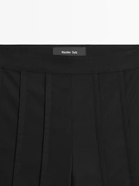 Wide-leg trousers with seam details