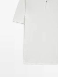 Polo en maille texturée de coton
